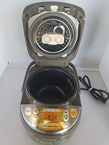 Zojirushi NP-NWC10XB AI logic panel enabling adaptive cooking for consistent results.