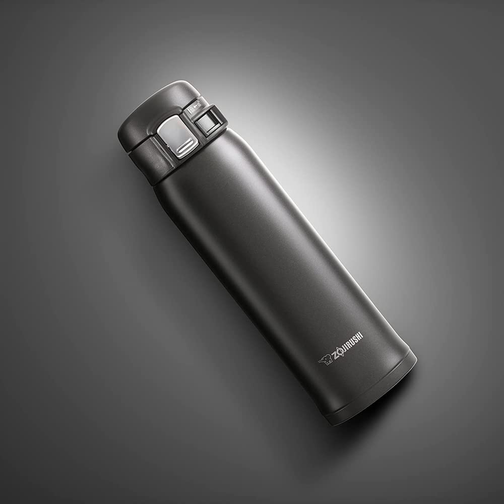 Zojirushi SM-SA48-BA mug with flip-open lid, showing one-hand operation for on-the-go sipping.