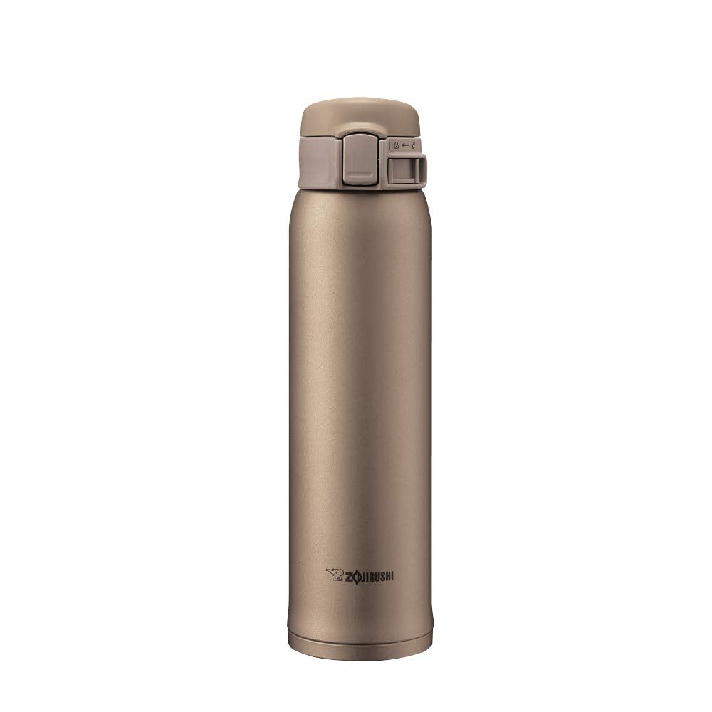 Zojirushi stainless mug front view shows a compact beige-gold design for on-the-go use.