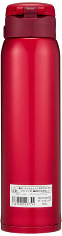 Zojirushi mug cap closed with secure flip-open lid for spill-free travel.