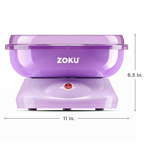 ZOKU machine in use, spinning floss into light strands.