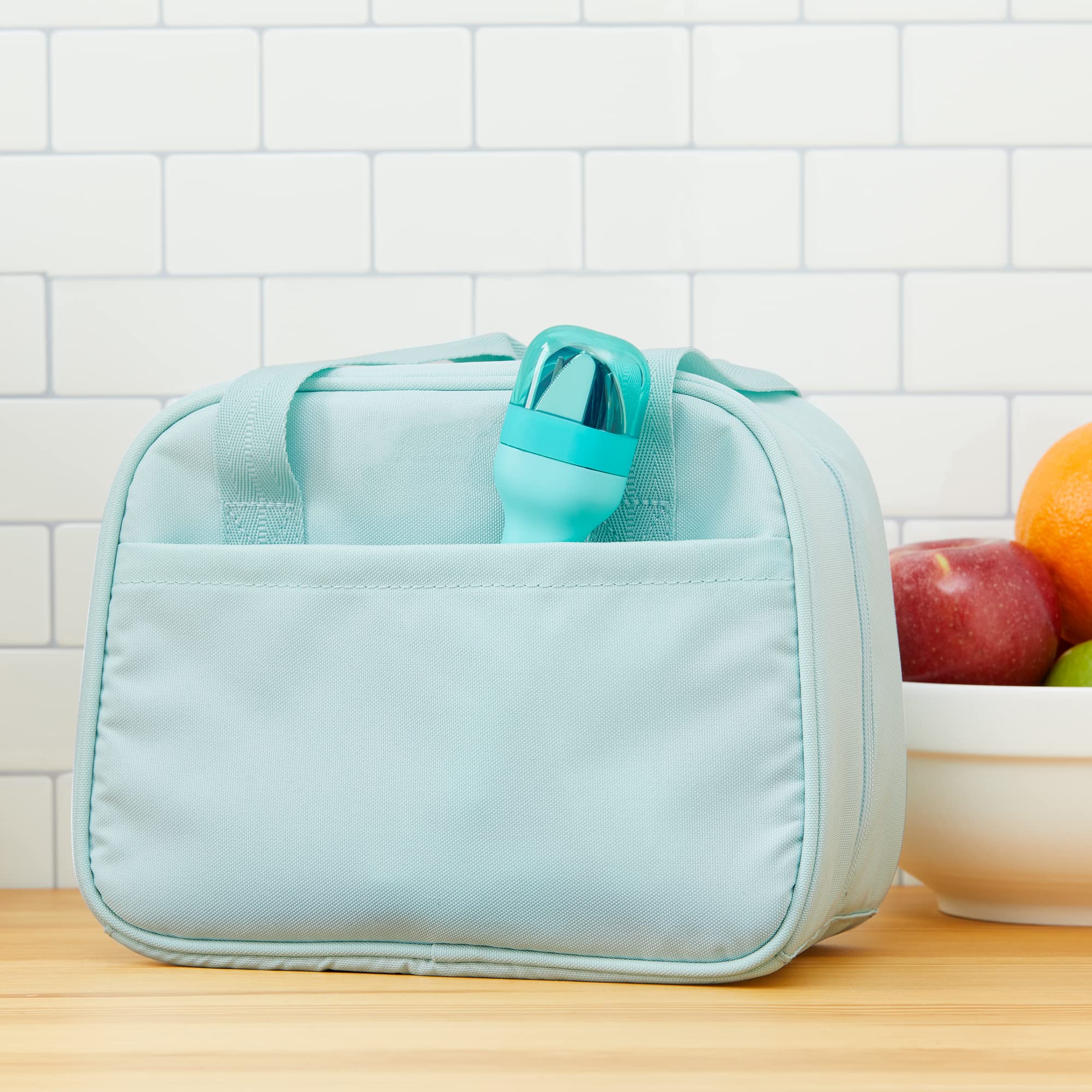 ZOKU teal travel pack keeps utensils organized and clean