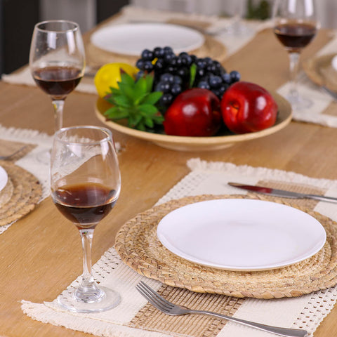 Zology round placemats add transitional tabletop charm.