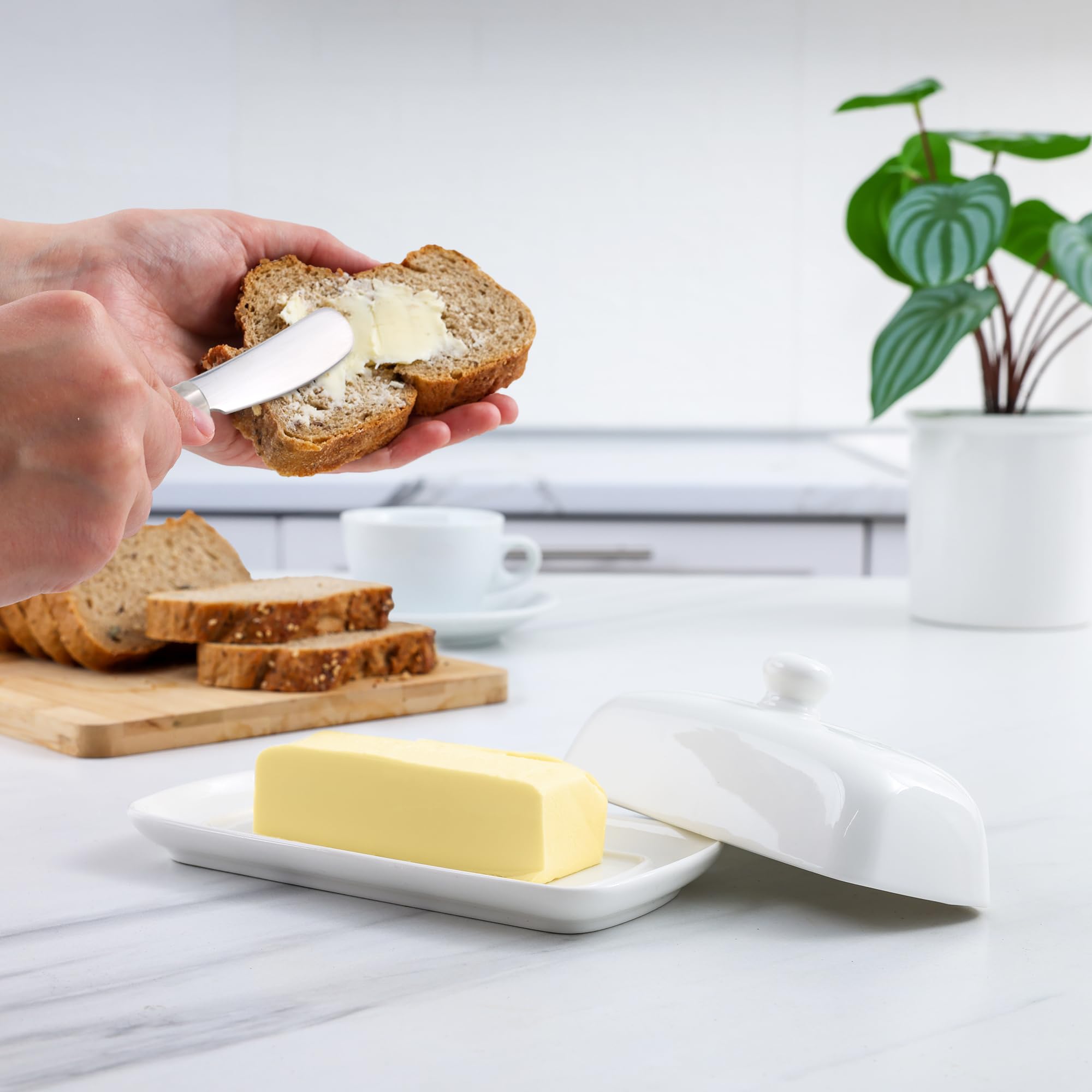 Zulay Kitchen butter dish raised edges keep butter steady during slicing.