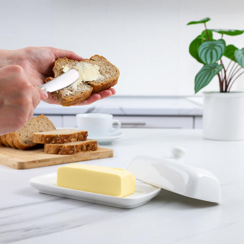 Zulay Kitchen butter dish raised edges keep butter steady during slicing.
