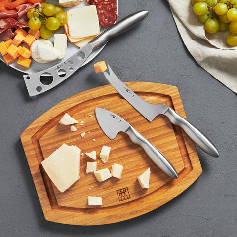 ZWILLING charcuterie knife set highlights cheese selection and presentation.