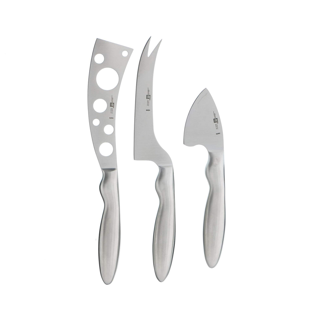 ZWILLING Collection 3-piece cheese knife set on a charcuterie board for versatile cheese prep.