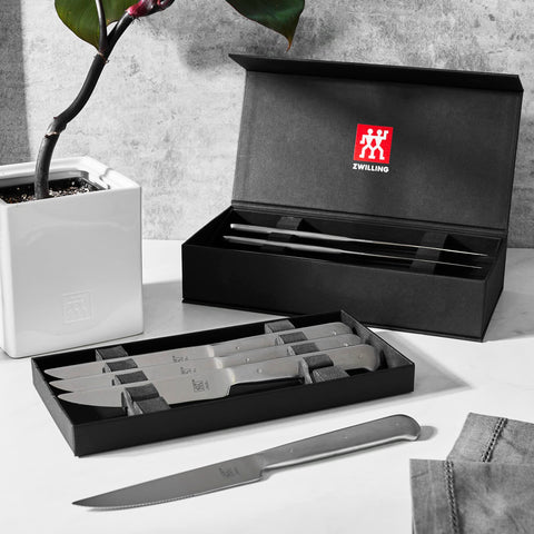 ZWILLING ergonomic stainless-steel handles offer a secure grip.