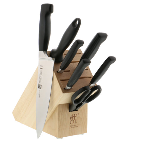 ZWILLING Four Star Anniversary knife block set with blades ready for precise prep.