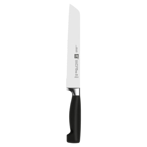ZWILLING Four Star Anniversary kitchen shears for versatile cutting tasks.