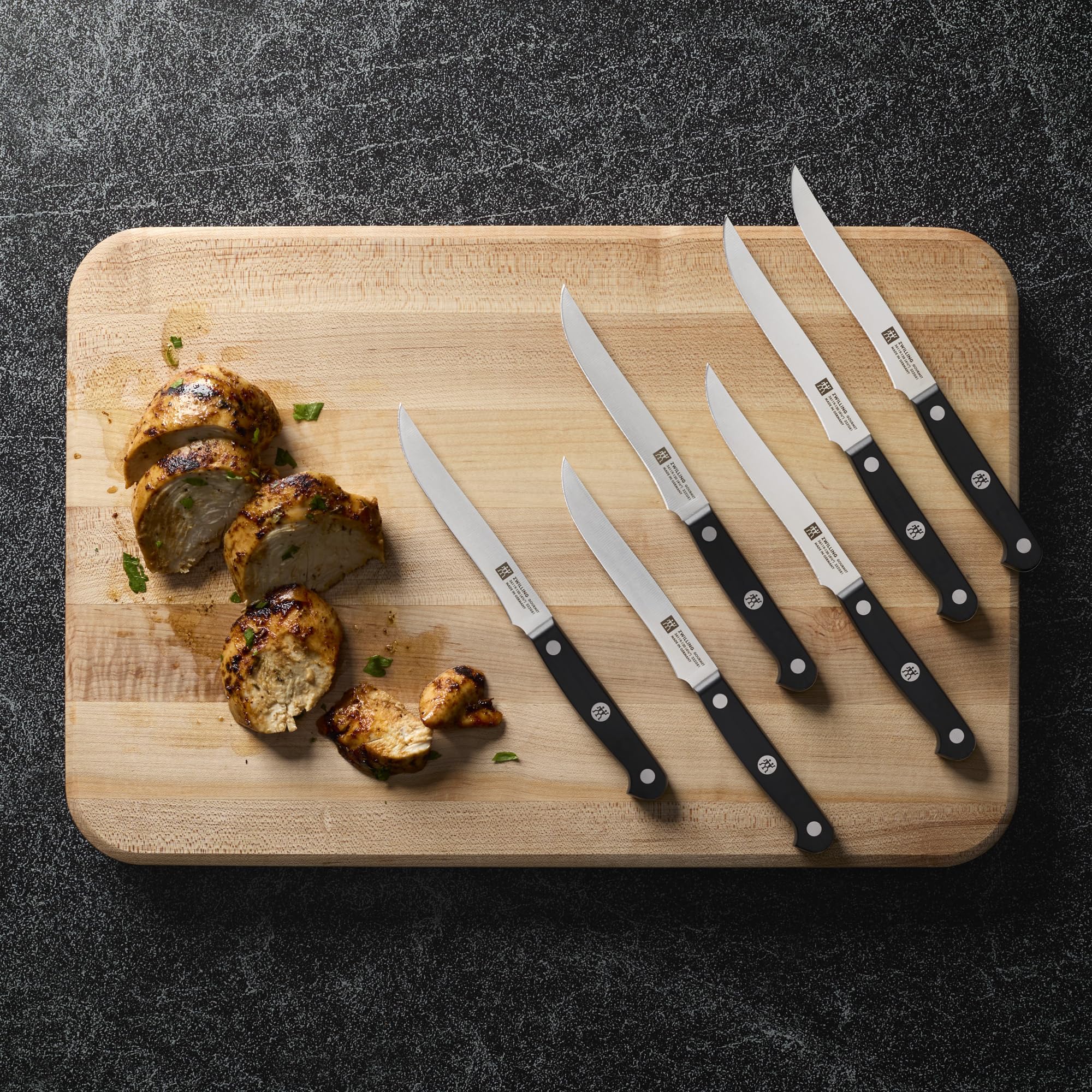 ZWILLING Gourmet 6pc steak knife set blade closeup highlights sharp, precise edges.