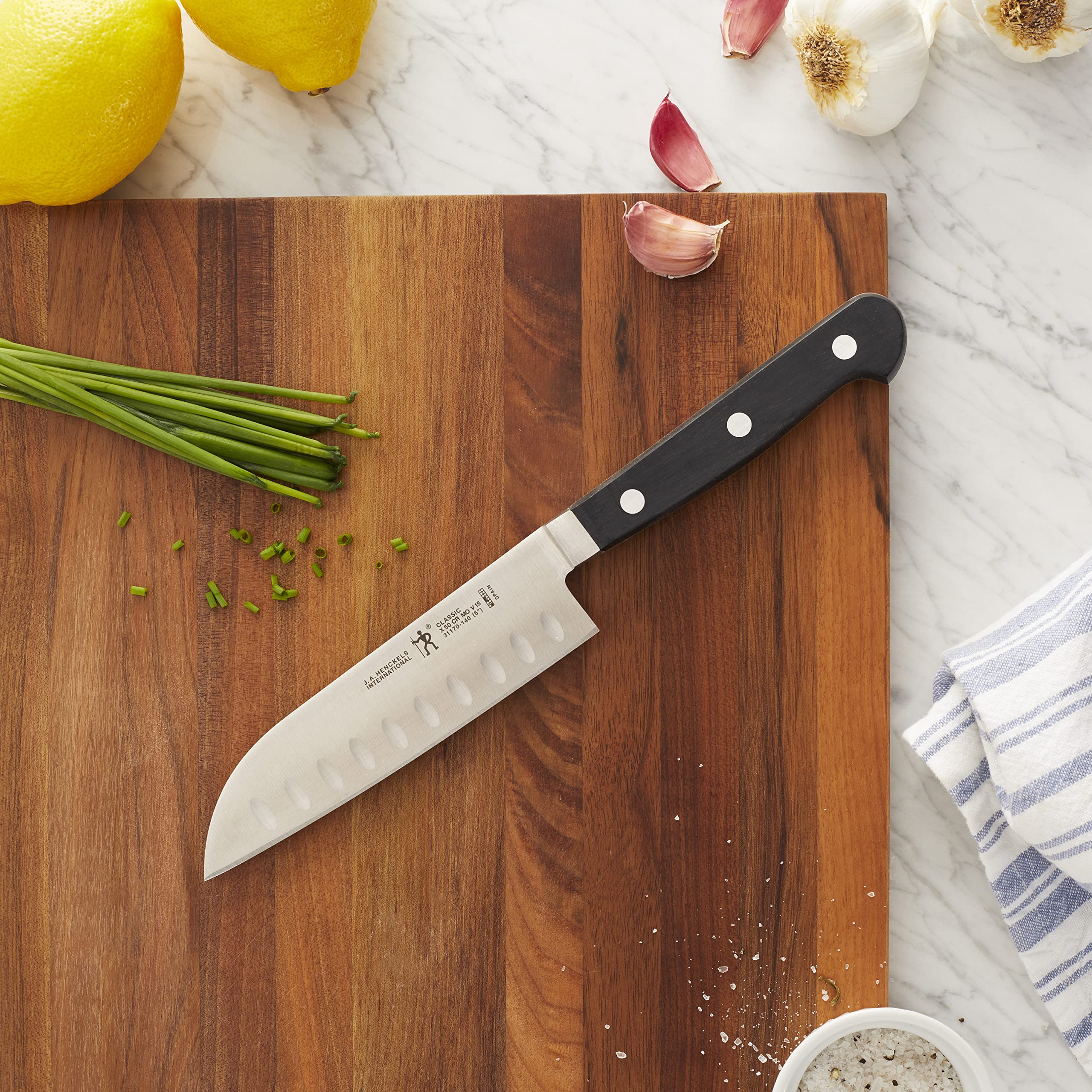 Zwilling Henckels Classic Santoku ergonomic triple rivet handle for balanced cutting