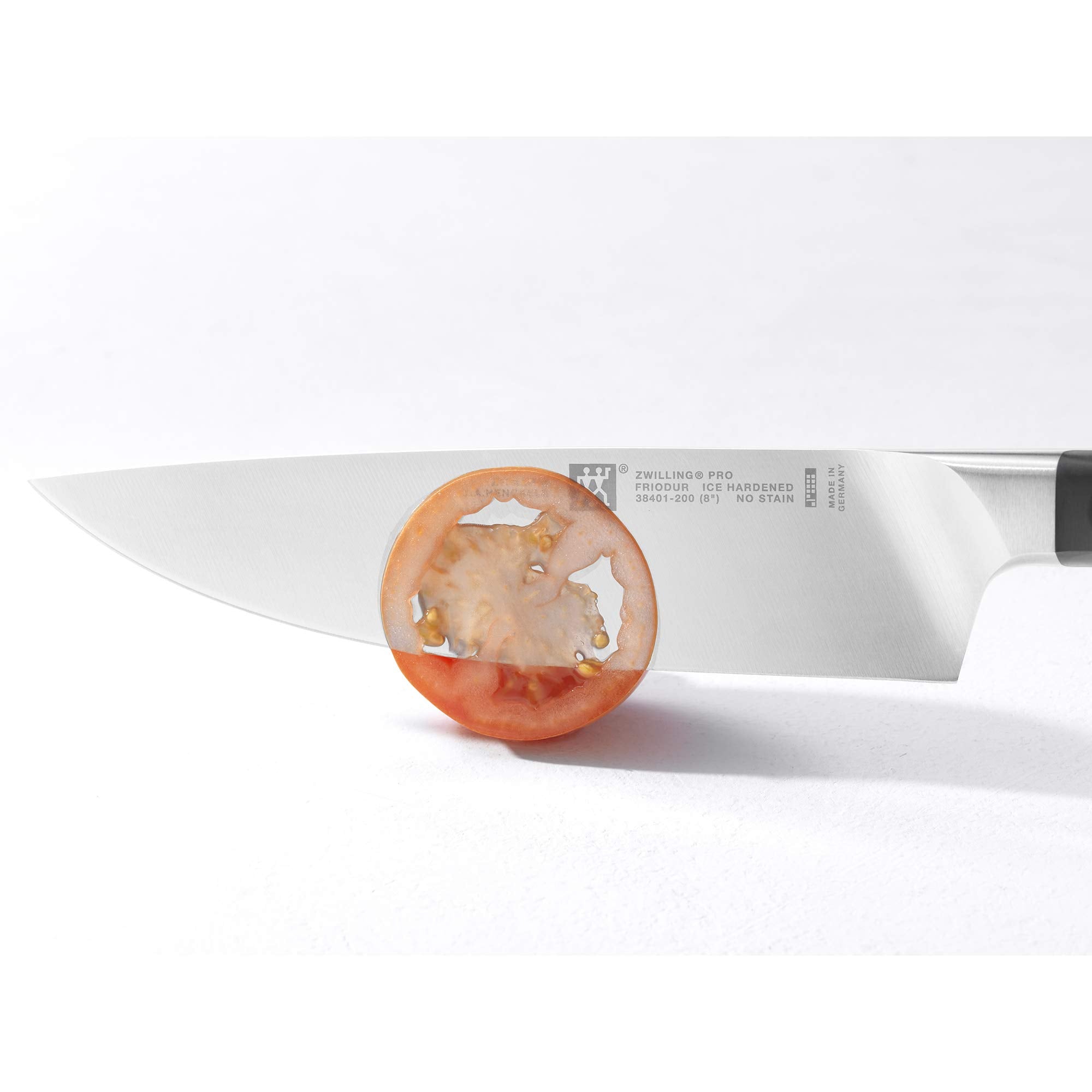 Zwilling Pro full-tang handle provides balanced, durable grip during long chopping sessions.