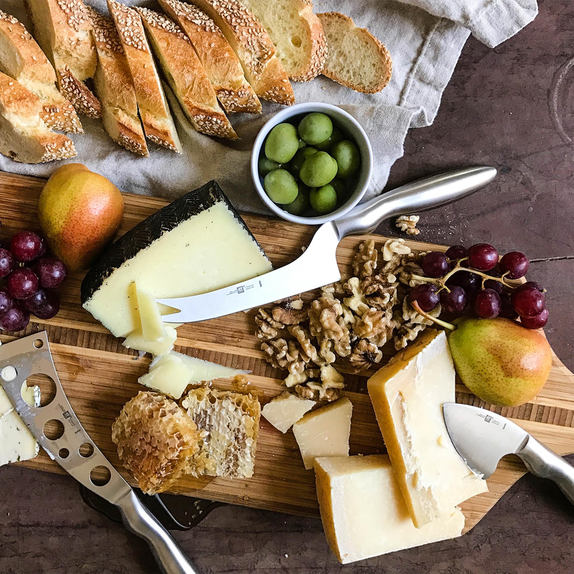 ZWILLING perforated cheese knife designed for clean cuts with semi-hard cheeses.