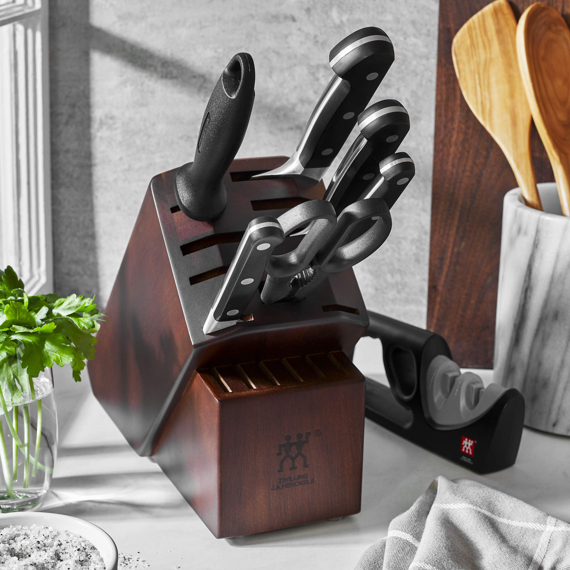 ZWILLING Pro 8-inch chef knife close-up highlighting sharp edge for precise slicing