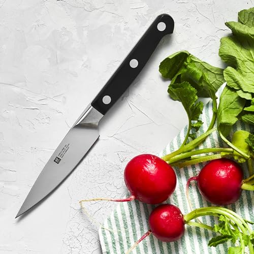 Zwilling Pro paring knife ergonomic handle supports fatigue-free prep.
