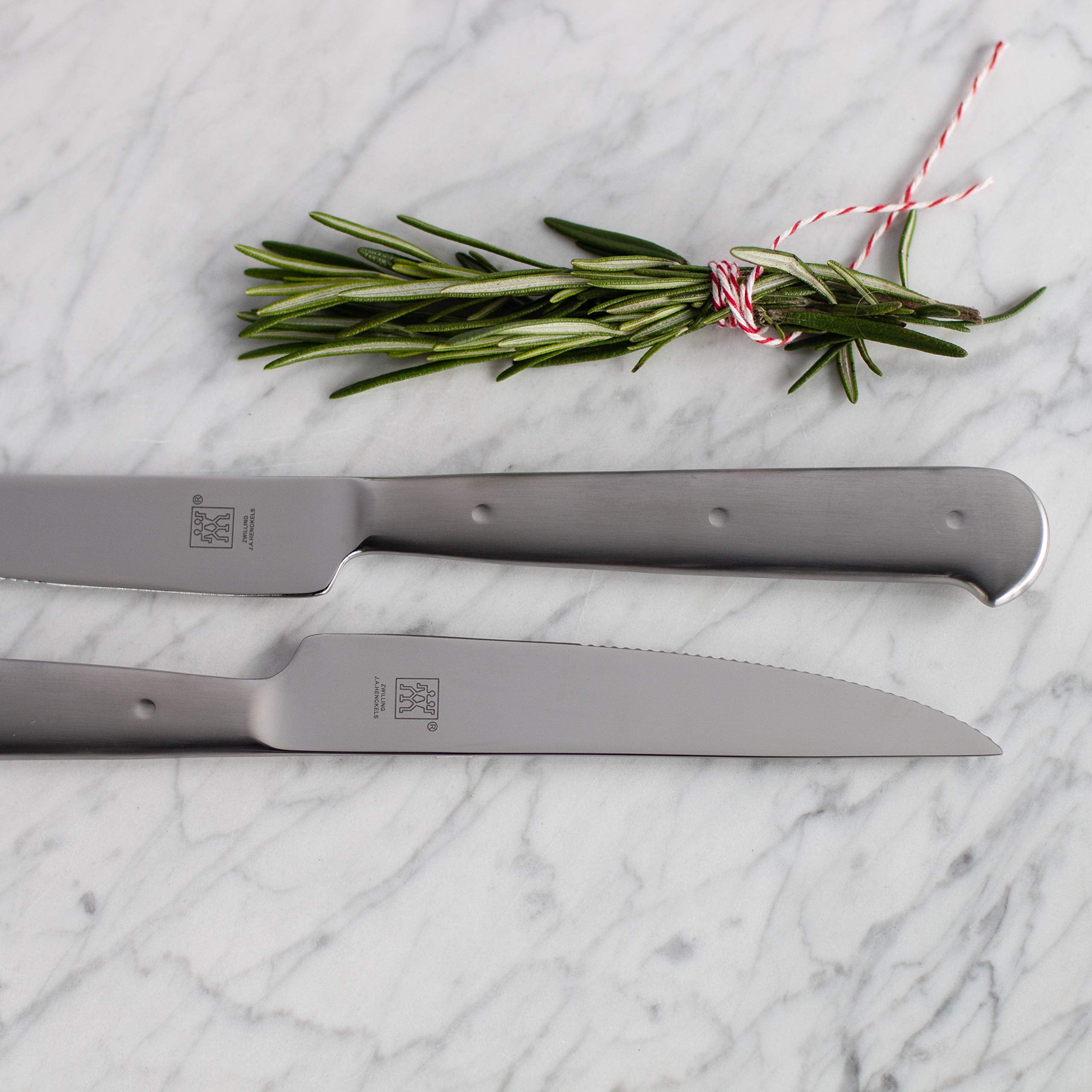 ZWILLING knives slice thick cuts with precise, controlled motion.