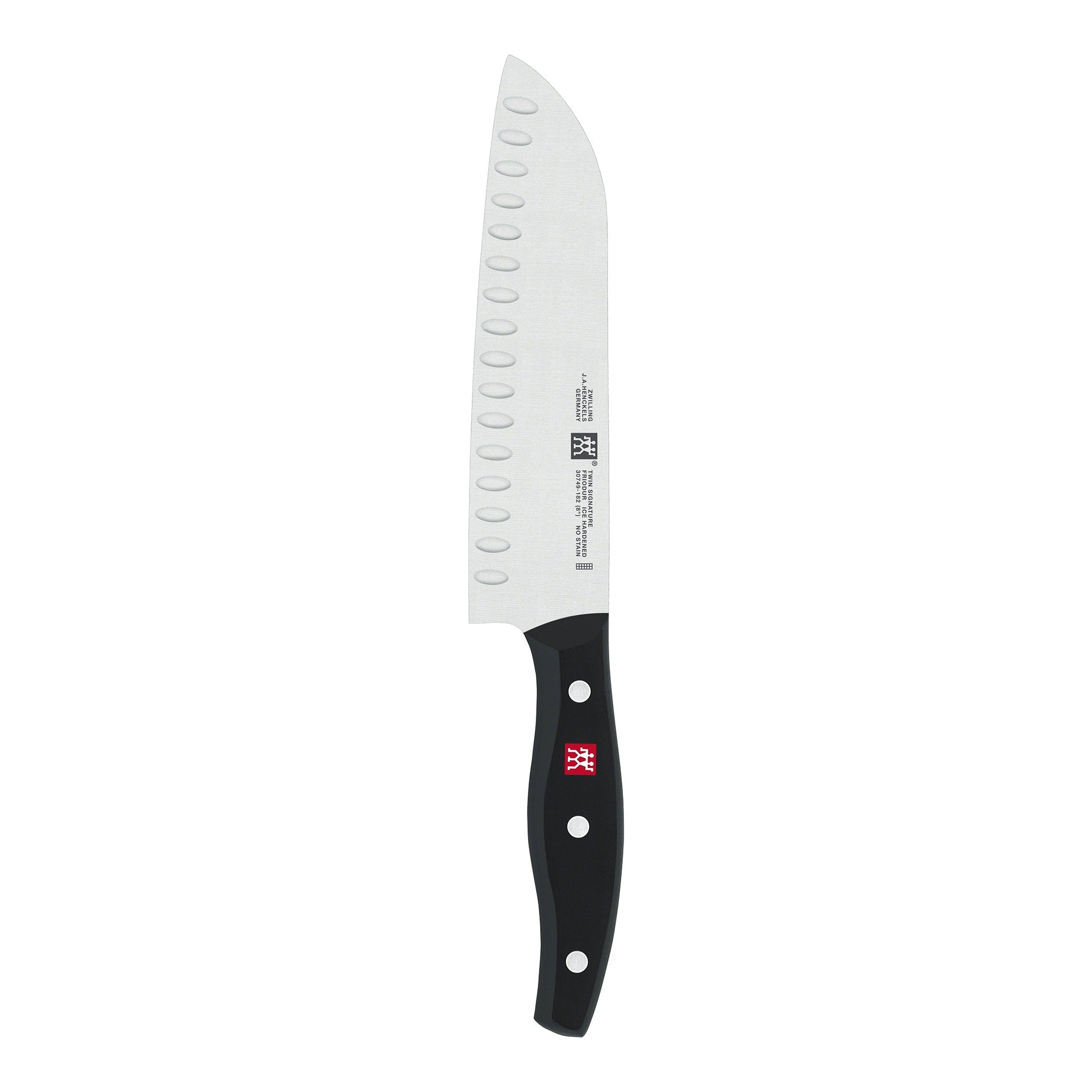 ZWILLING Twin Signature 7-inch hollow-edge Santoku blade for precise slicing.