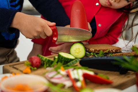 Zwilling Twinny finger guards and storage cover prevent slips during kid-friendly kitchens.
