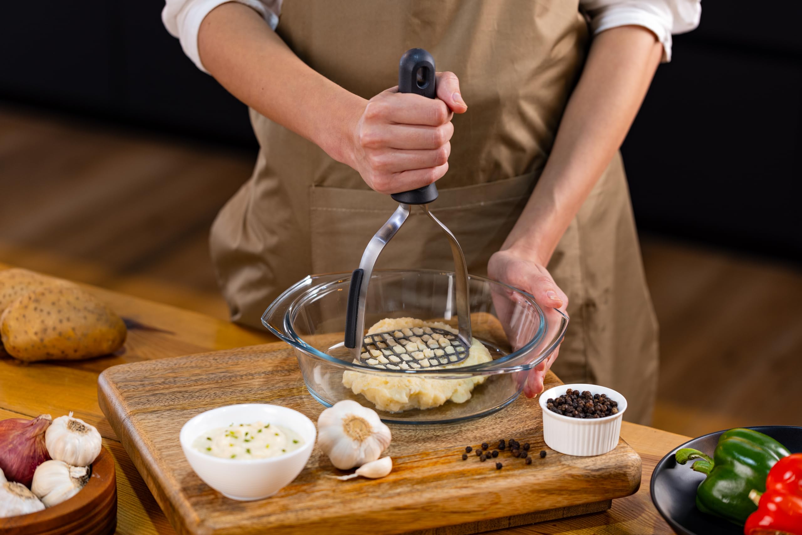 Zyliss potato masher in dishwasher-safe design for quick cleanup.